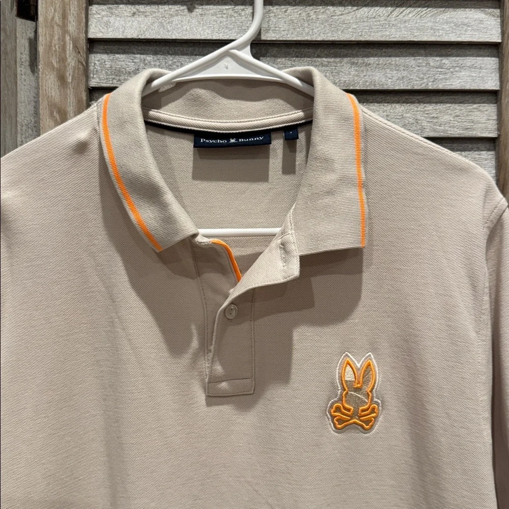 116. Psycho Bunny Men’s Tan Polo with Orange Details pre owned size 7